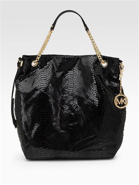 michael kors black patent leather tote|michael kors black nylon tote.